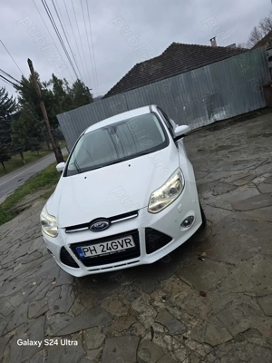 Ford Focus an 2013 ,benzina