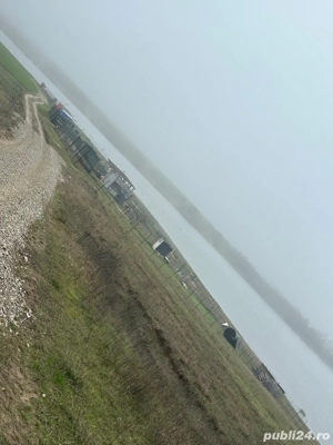 Teren intravilan cu iesire la lac