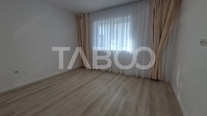 Casa moderna cu 4 camere 2 bai si curte in Selimbar zona rezidentiala - imagine 11