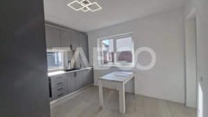 Casa moderna cu 4 camere 2 bai si curte in Selimbar zona rezidentiala - imagine 4