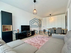 De închiriat apartament cu 2 camere, modern, cu loc de parcare subterană inclus