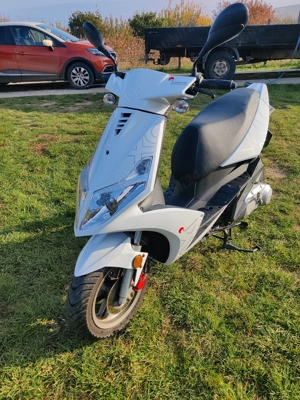 Scuter 125 cm cubi - imagine 4