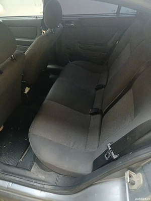 Vand urgen Opel Astra G  - imagine 7