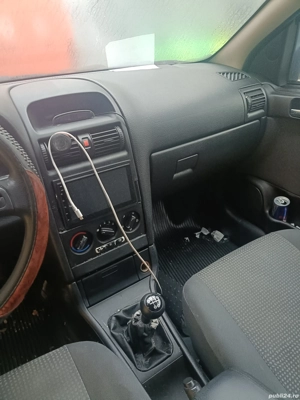 Vand urgen Opel Astra G  - imagine 8