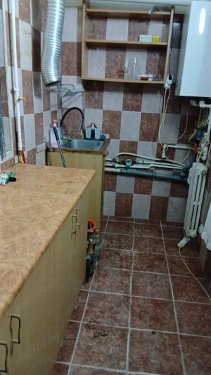 Inchiriez ap.2 cam. decomandate,parter,nemobilat.Se poate închiria și ca spațiu comercial,birouri - imagine 5