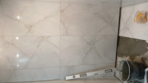 Am 14 pachete de faianță 60 120 a câte 2 placi pe pachet este cea din poze ce mia mai ramas