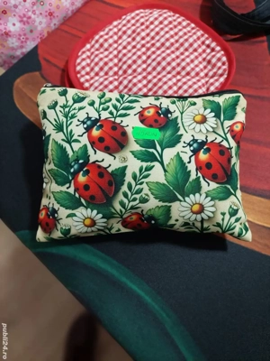 Portmoneu  buburuze. 