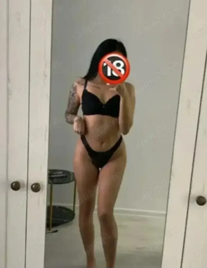  Brunetă sexi  am revenit  pupici 