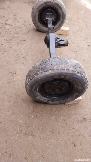 Vând axă de remorcă lățime 140 între roți 