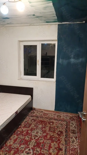 Vând în rate garsoniera!