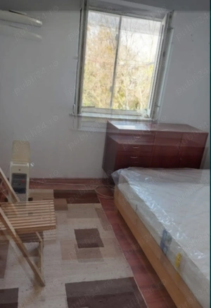 Vând în rate garsoniera!