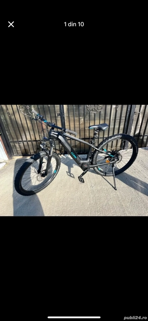 Vând bicicletă Cube Reaction Hybrid 625 