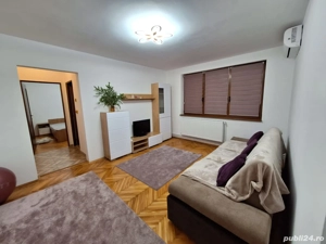 Închiriez apartament cu 2 camere