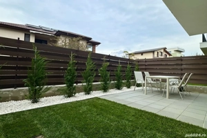 Apartament cu grădină și parcare privată