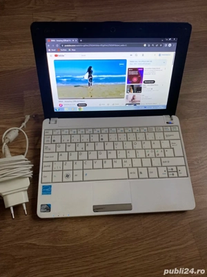Mini Laptop Asus display 11 inch led,160gb memorie baterie buna perfect functional,vine cu incarcato