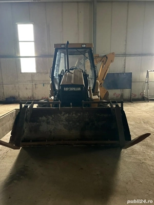 Vand buldo excavator Caterpillar an 1996 