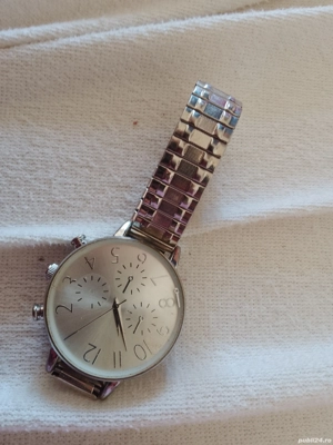 vand ceas marca avon