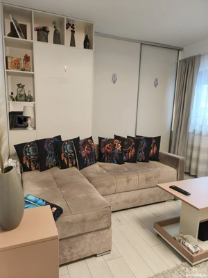 Apartament cu balcon și curte