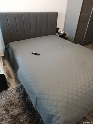 Vând pat nou 140  200, gri deschis , rabatabil cu somiera 