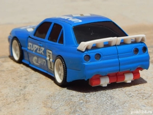 Jucarie masina robot Nissan Skyline GT-R BCNR33 Transformers Buddy L sc 1:32 - imagine 2