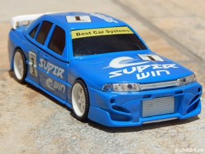 Jucarie masina robot Nissan Skyline GT-R BCNR33 Transformers Buddy L sc 1:32