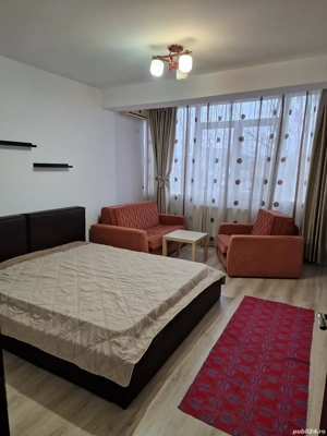 Garsoniera de vânzare Aurel Persu etajul 2 4 decomandată bloc mixt cu lift și loc de parcare inclus