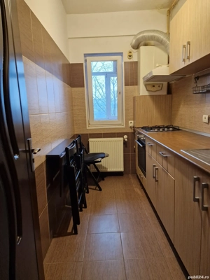 Garsoniera de vânzare Aurel Persu etajul 2 4 decomandată bloc mixt cu lift și loc de parcare inclus - imagine 2