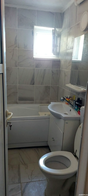 Inchiriez sau vând apartament cu patru camere în Caracal - imagine 3