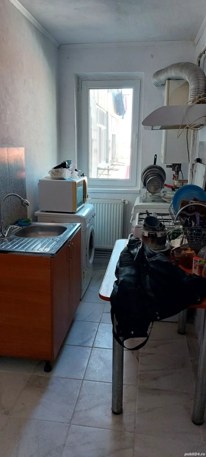 Inchiriez sau vând apartament cu patru camere în Caracal - imagine 7