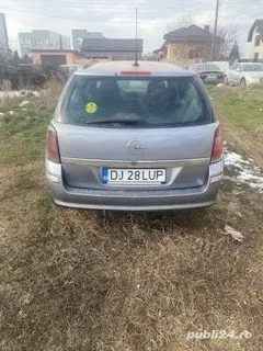 Vand Auto Opel Astra h 2006 motor 1,7 DCI 101 CP;anvelope iarna+vara cu jenti de tabla - imagine 5