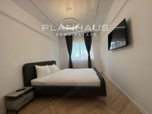 Inchiriere-ultramodern apartament zona rezidentiala ,3 camere,etaj 1,loc de parcare  - imagine 11