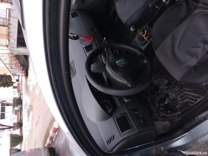 vând skoda fabiea  - imagine 5