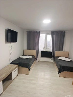 închiriez garsonieră  - imagine 3