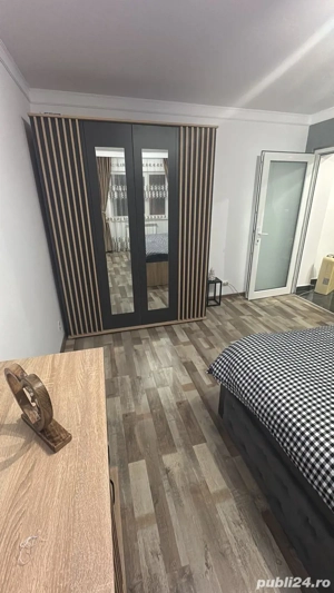 Apartament o camera in regim hotelier - imagine 2