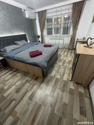 Apartament o camera in regim hotelier