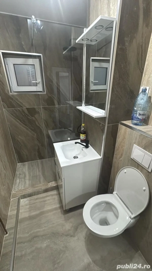 Apartament o camera in regim hotelier - imagine 3