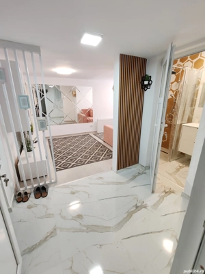 Închiriez casa renovata cu curte în zona ALUNIS 