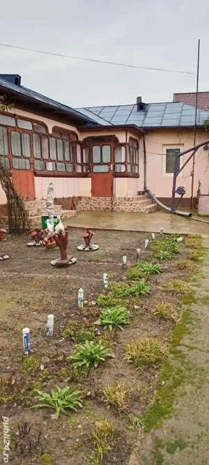 Schimb Casa la tara,cu apartment!