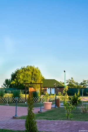 Proprietate cu clădiri multifuncționale (pensiune, baltă de pescuit, hală cu spații de depozitare). - imagine 7