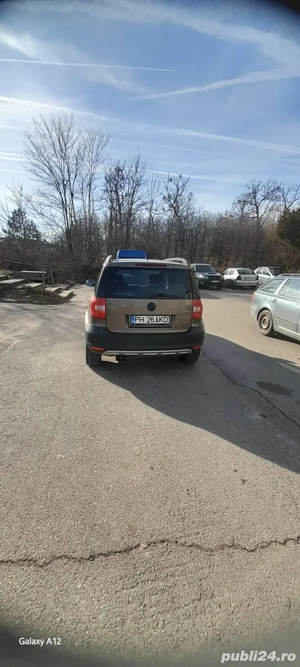 Skoda Yeti 4x4,2.0 tdi Adventure - imagine 4