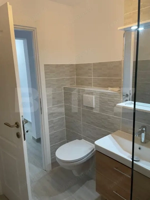 APARTAMENT 3 CAMERE DECOMANDAT IN ZONA DEOSEBITA CU VEDERE SPRE BULEVARD - imagine 2