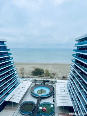 Apartament cu 2 dormitoare,living,bucătărie,o baie, terasă și parcare subterană,la etajul 10 central