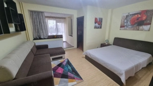 Garsonieră Titan, bloc reabilitat, etaj 7, balcon închis, mobilată