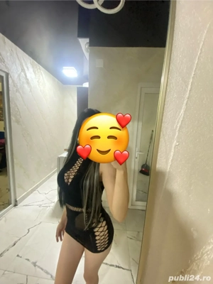 Buna sunt o brunetra focoasa