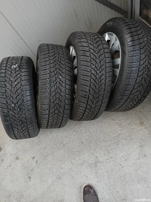 Vind cauciucuri de iarna cu jante și capace 205/55/16  vw Passat  - imagine 5