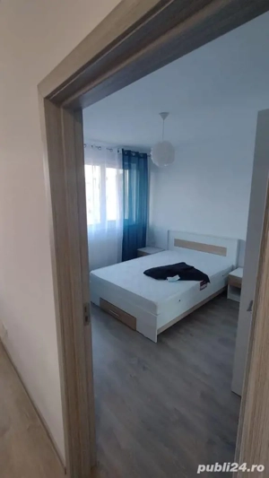 Inchiriez apartament cu 3 camere 2 bai parcare subterana 