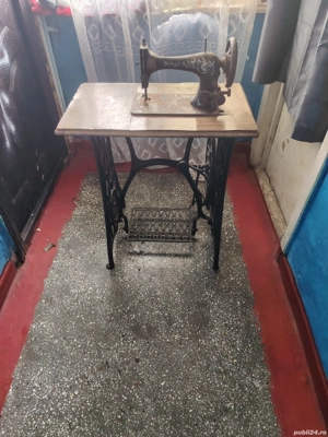 Mașina de cusut singer