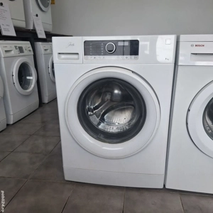  Whirlpool    capacitate cuvă 7 kg. import Germania. 