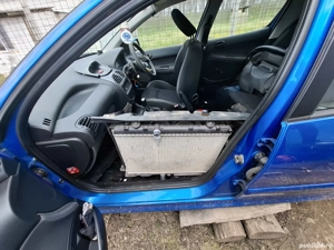 Dezmembrez peugeout 206 1.4 benzină - imagine 4