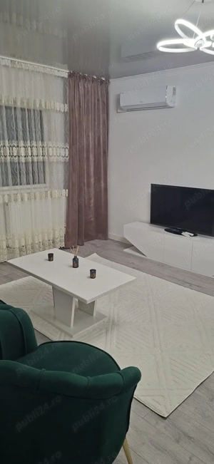 Închiriez apartament 2 cam.Loc. Roman .Sunt  proprietar.